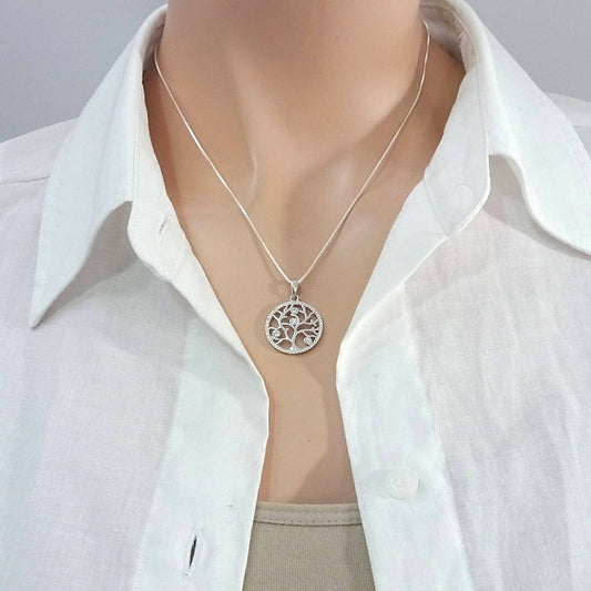 tree of life necklace on a model mannequin