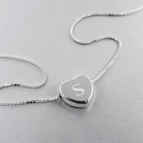 heart necklace engraved with letter S