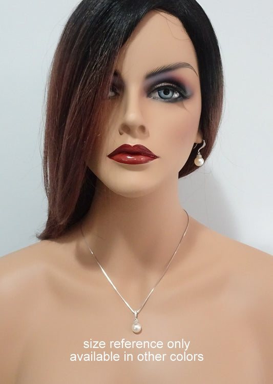 necklace and earrings on a model mannequin