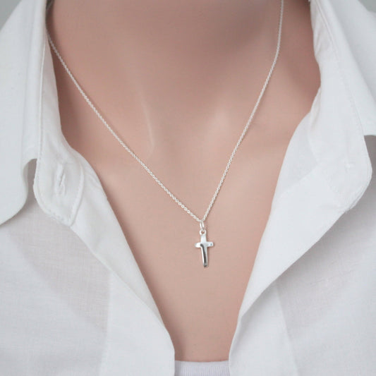 cross necklace on a model mannequin