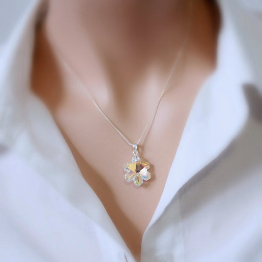 snowflake crystal necklace on a model mannequin
