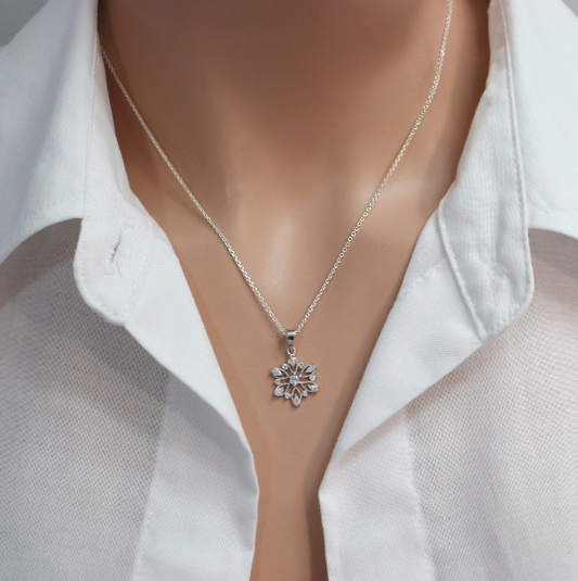 cubic zirconia snowflake necklace on a model mannequin