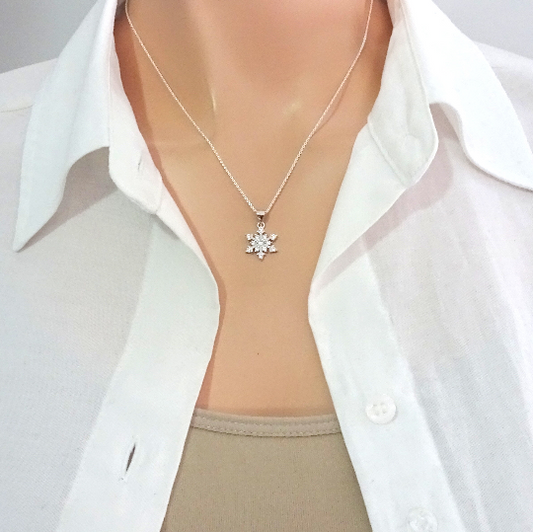 cubic zirconia snowflake necklace on a model mannequin