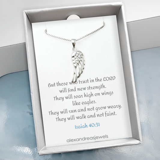 A silver necklace with a pendant featuring a winged design, accompanied by a religious quote from Isaiah 40:31.