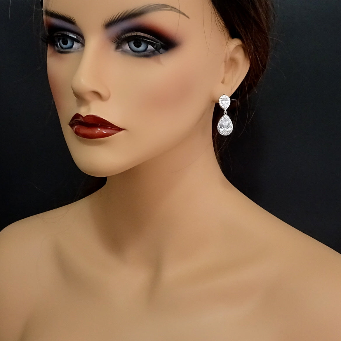 clear cubic zirconia drop crystal earrings on a model mannequin