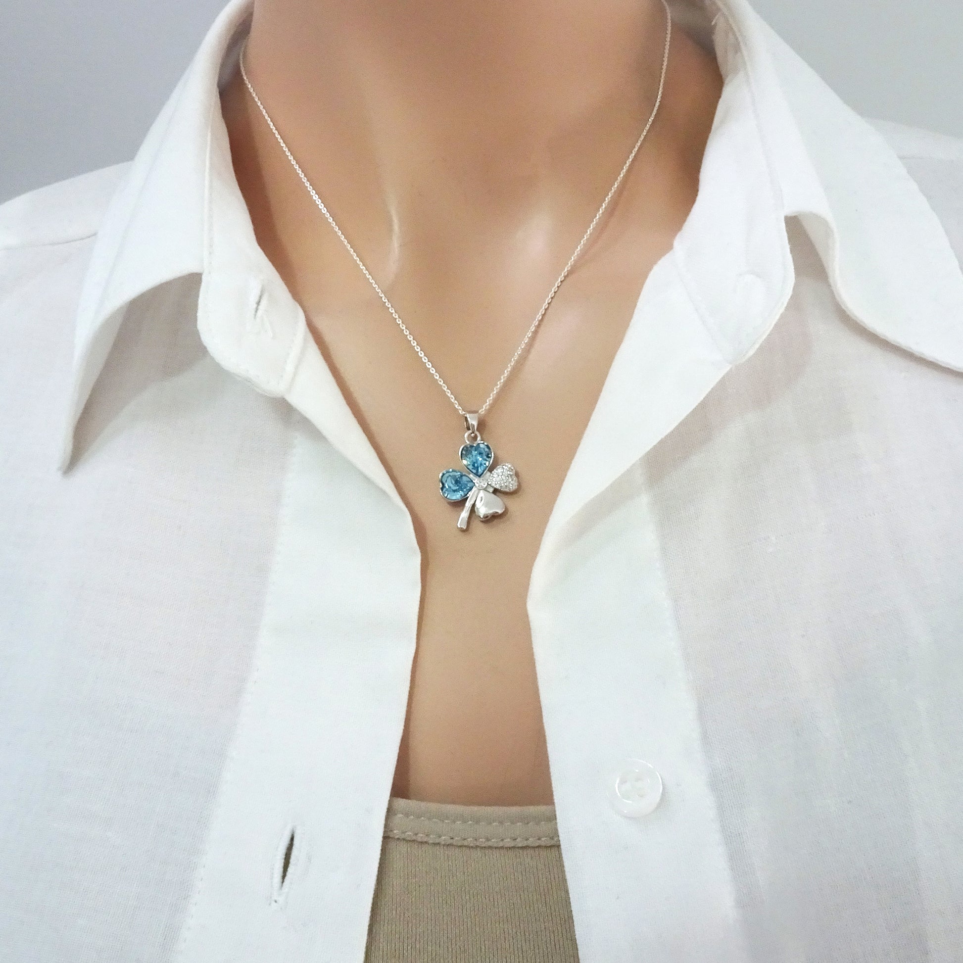 cubic zirconia four leaf clover necklace on a model mannequin