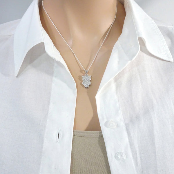 owl necklace on a model mannequin