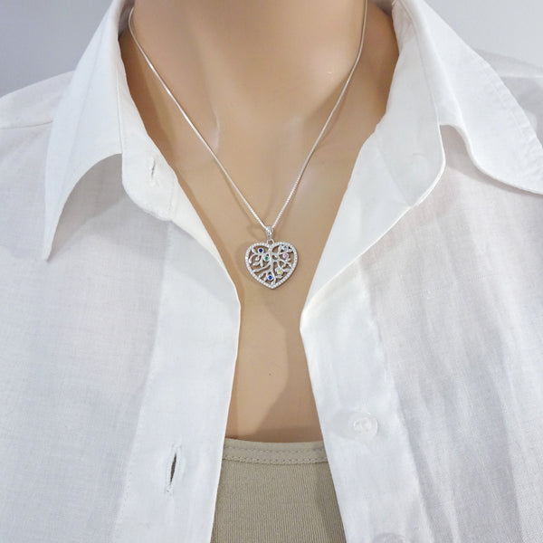 heart tree of life necklace on a model mannequin
