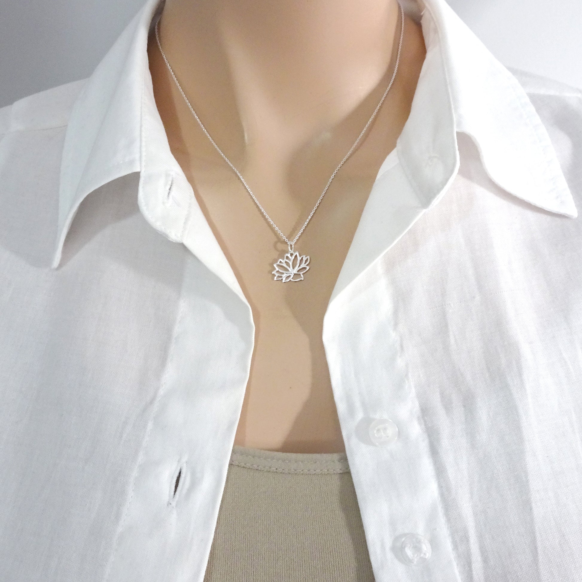 lotus flower necklace on a model mannequin