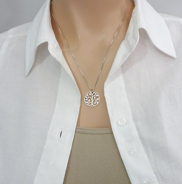 tree of life necklace on a model mannequin