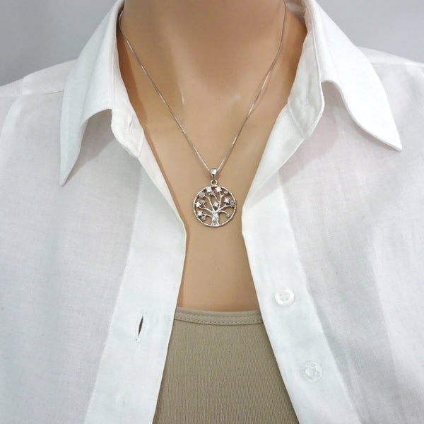 tree of life cubic zirconia necklace on a model mannequin