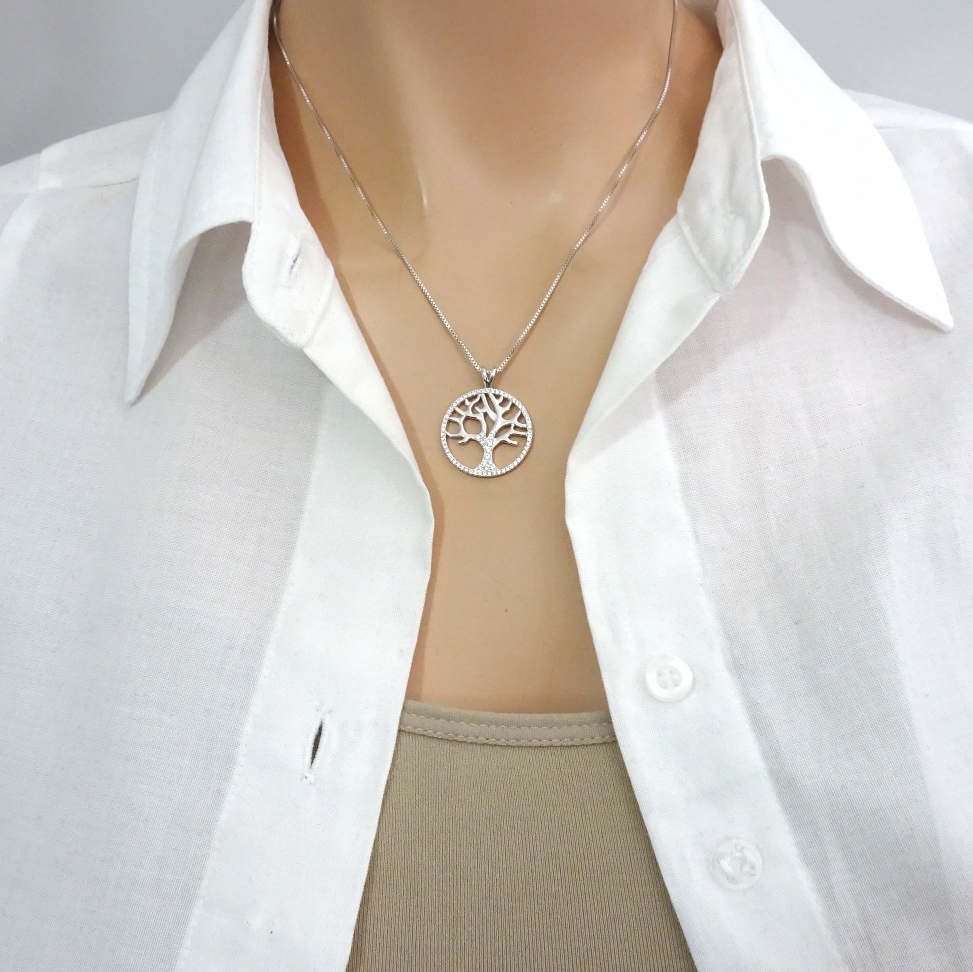 tree of life cubic zirconia necklace on a model mannequin