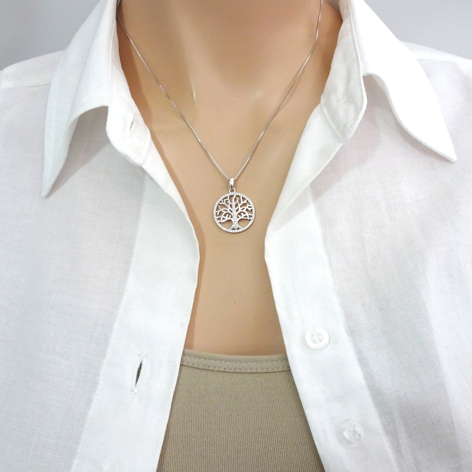 tree of life cubic zirconia necklace on a model mannequin