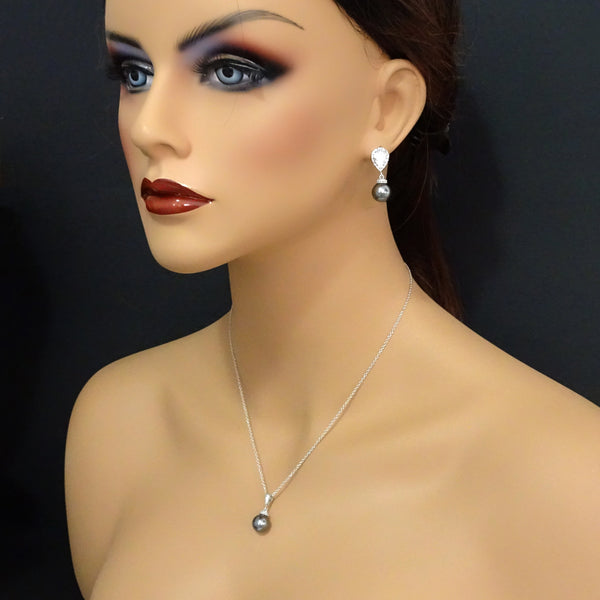 dark grey pearl cubic zirconia necklace and earrings set on a model mannequin