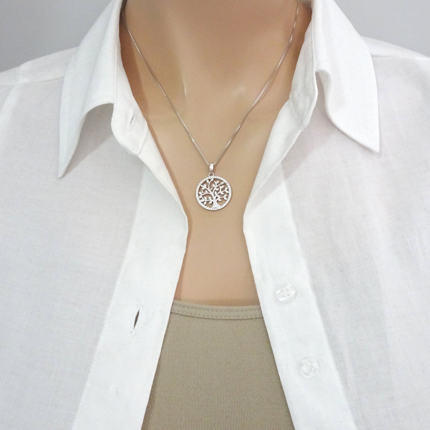 tree of life cubic zirconia necklace on a model mannequin