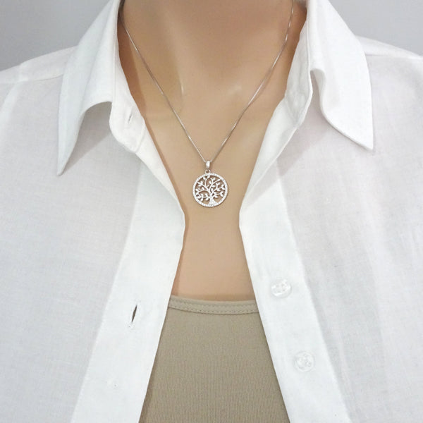 tree of life cubic zirconia necklace on a model mannequin