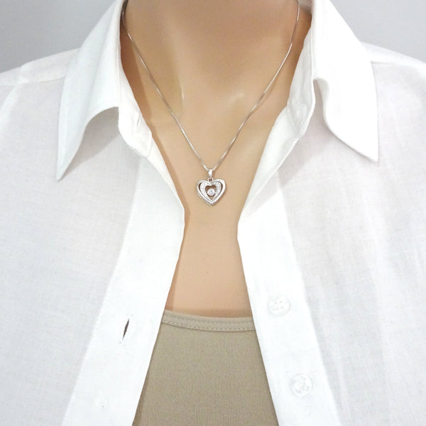 heart with cz stone necklace on a model mannequin