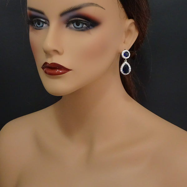 cubic zirconia dark blue crystal dangle earrings on a model