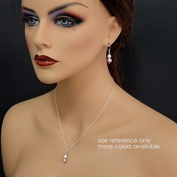 pearl necklace and earrings set on a model mannequin