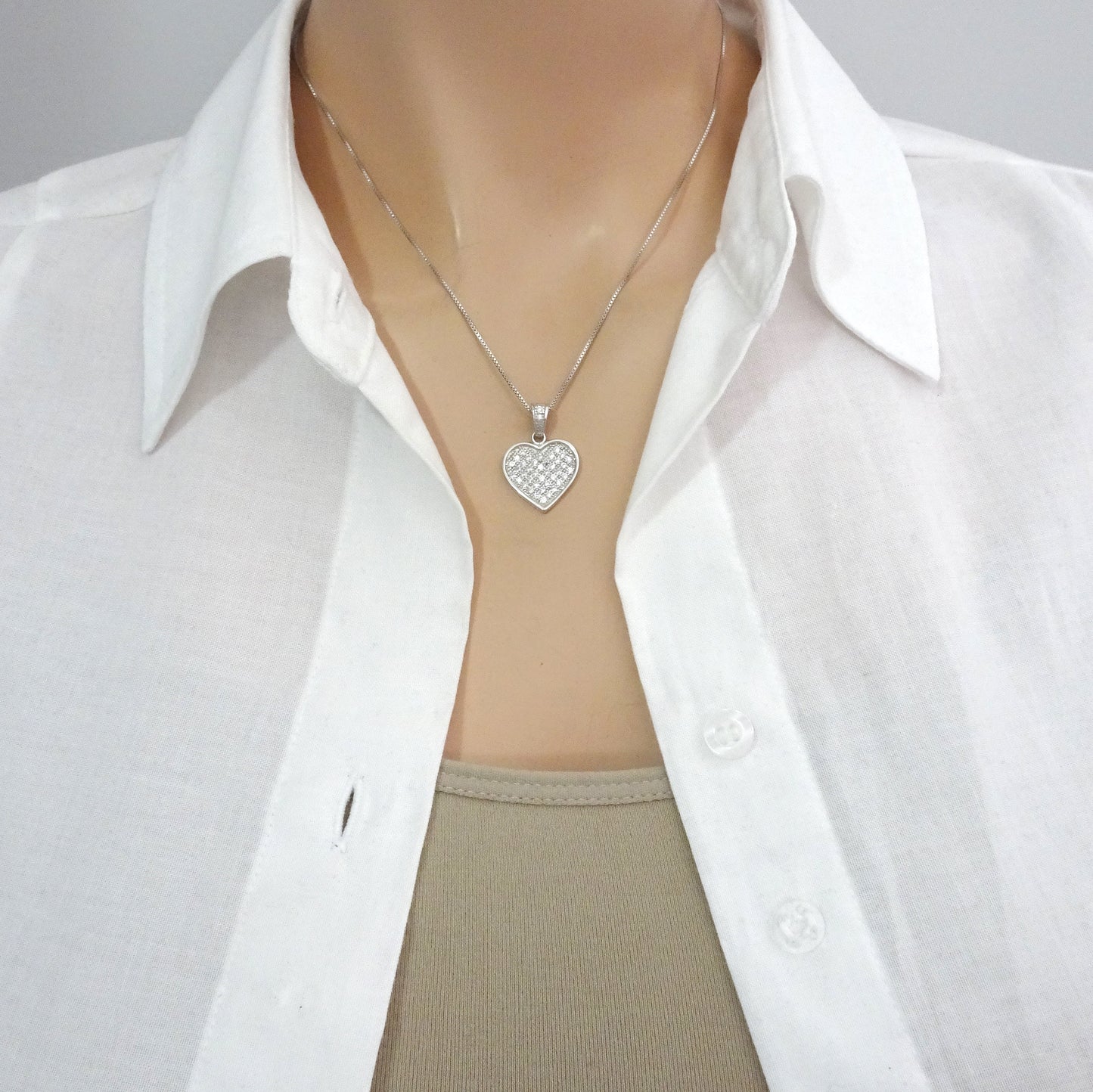 cubic zirconia sterling silver heart necklace on a model mannequin