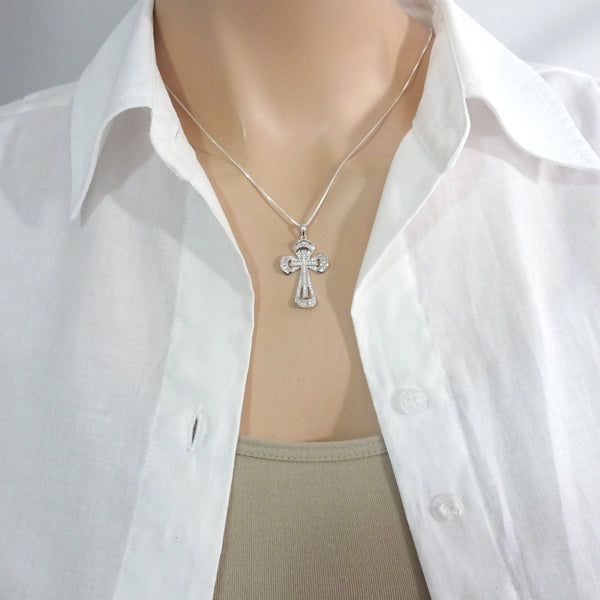 cubic zirconia cross necklace on a model mannequin