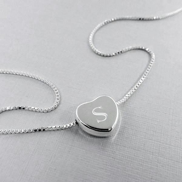 heart necklace engraved with letter S