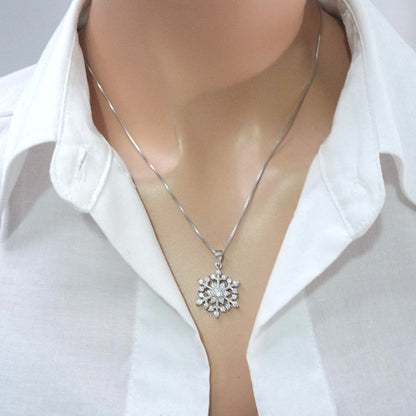 cubic zirconia snowflake necklace on a model mannequin