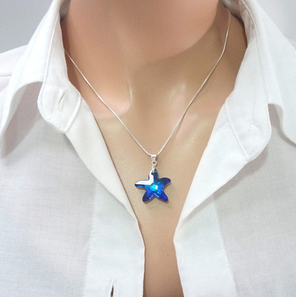 bermuda blue crystal starfish necklace on a model mannequin