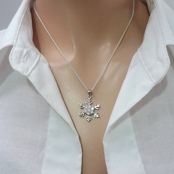 snowflake necklace on a model mannequin