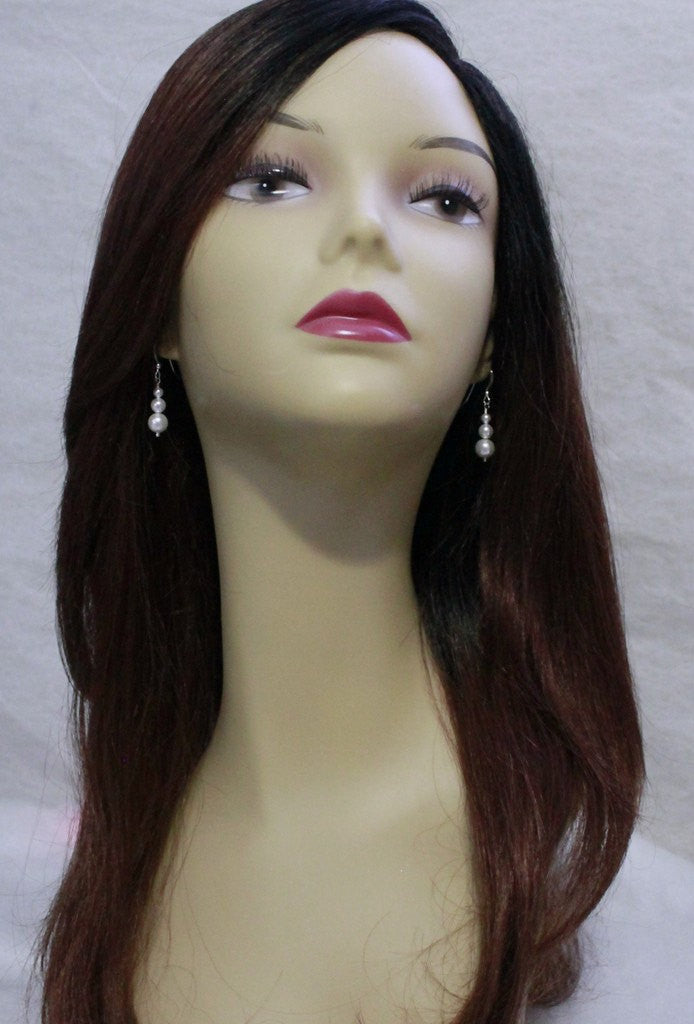 ivory pearl earrings on a model mannequin