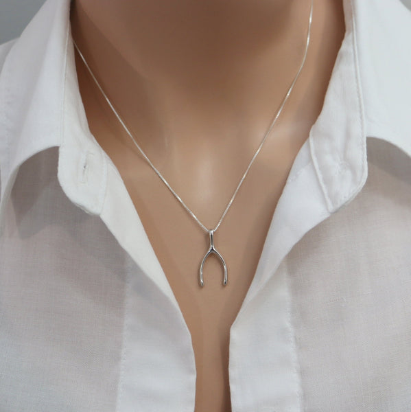 wishbone necklace on a model mannequin