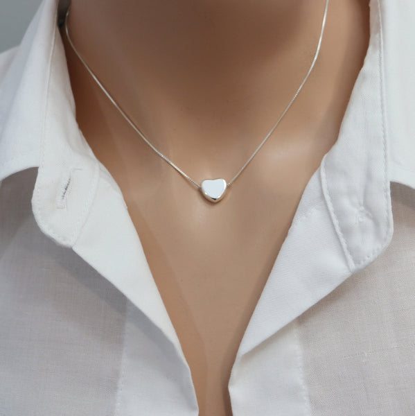 heart crystal necklace on a model mannequin