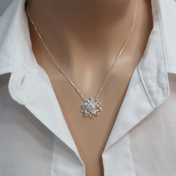 crystal flower necklace on a model mannequin