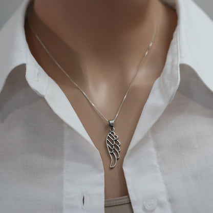 angel wing necklace on a model mannequin