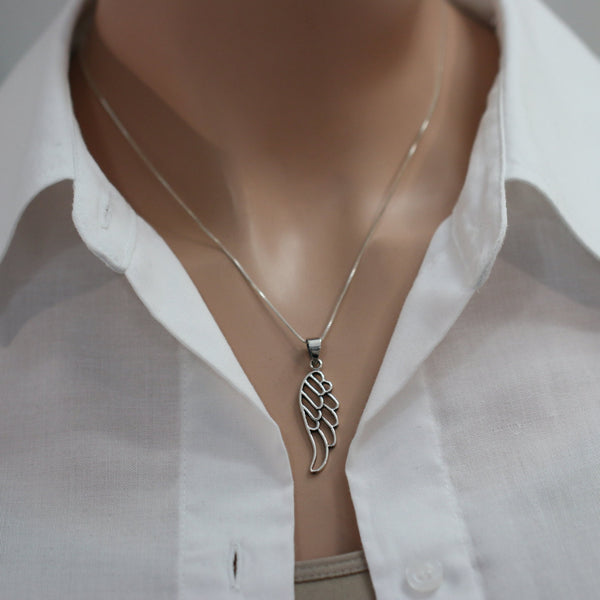 angel wing necklace on a model mannequin