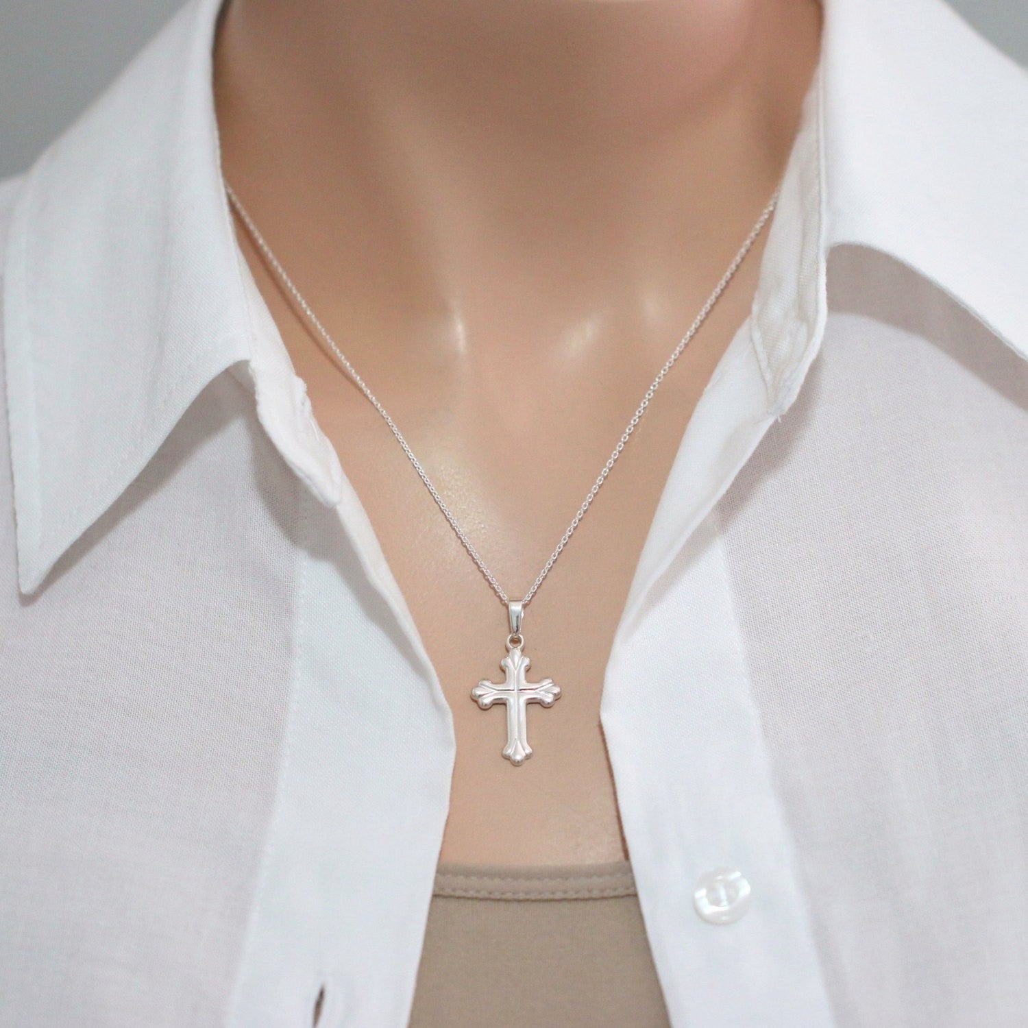 cross necklace on a model mannequin