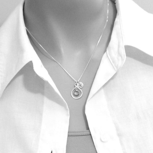 infinity necklace on a model mannequin