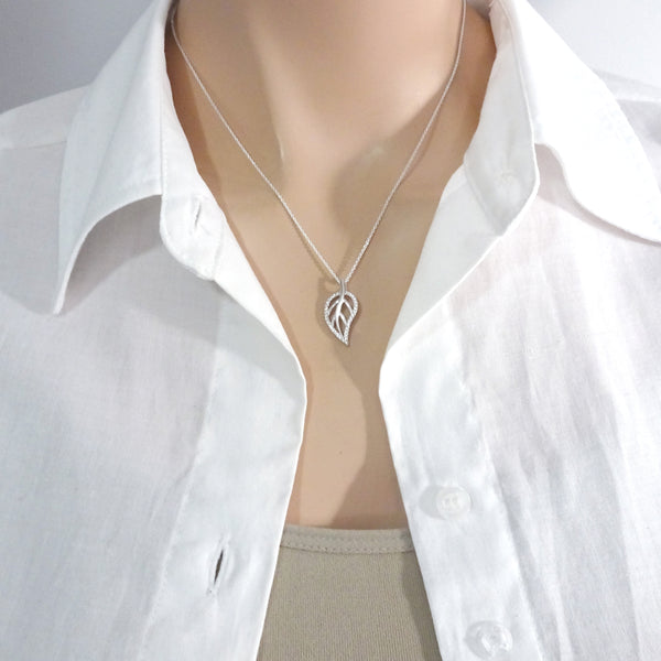 sterling silver leaf necklace on a model