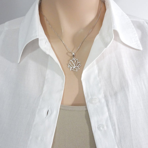lotus flower necklace on a model mannequin