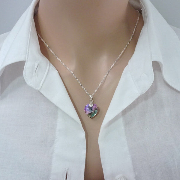 purple crystal heart necklace on a model mannequin