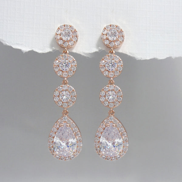 cubic zirconia pear crystal long dangle earrings in rose gold plated finish