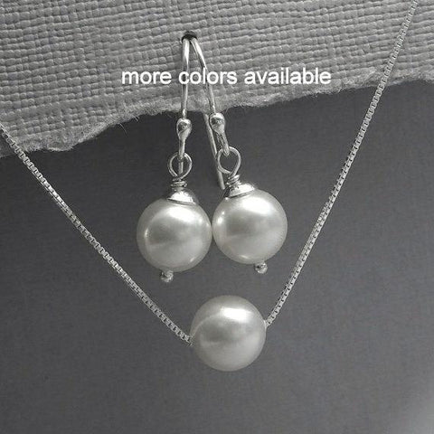 white floating pearl necklace and earrings