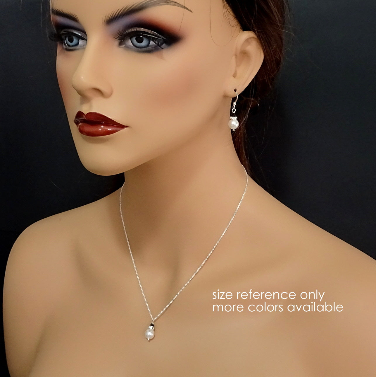 pearl and crystal necklace and earrings set on a model mannequin