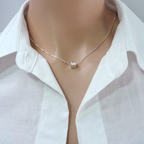 sterling silver cube necklace on a model mannequin
