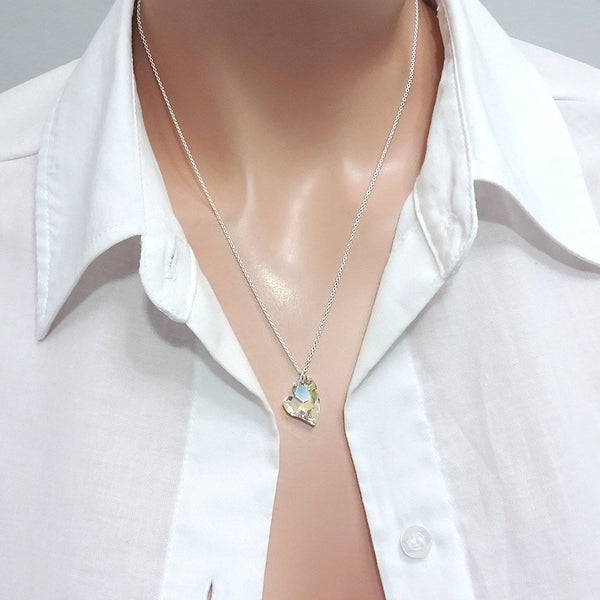 crystal heart necklace on a model mannequin