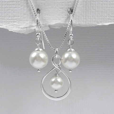 infinity and white pearl necklace and earrings set