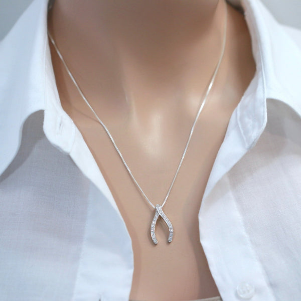 cubic zirconia wishbone necklace on a model mannequin